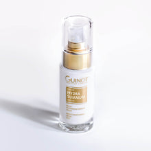 Load image into Gallery viewer, A pump bottle of Guinot HYDRA Summum Serum with a white and gold label, indicating it is a moisturizing facial serum.