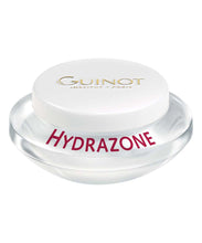 Load image into Gallery viewer, A jar of Guinot HYDRAZONE cream with a white lid, clear in color, with the brand Guinot in gold visible on the lid.