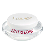 Load image into Gallery viewer, A jar of Guinot Nutrizone cream with a white lid, primarily designed for skin nourishment.