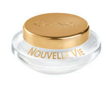 Load image into Gallery viewer, A jar of 'Nouvelle Vie' cream by Guinot, primarily in a clear container with a gold lid, indicating it is a moisturizing skin care product.